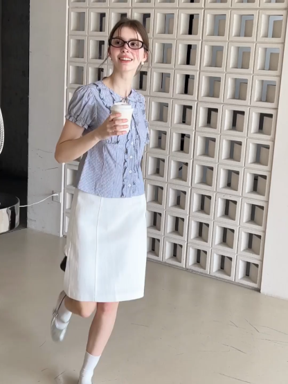 Striped short sleeve shirt with ruffles and tie front