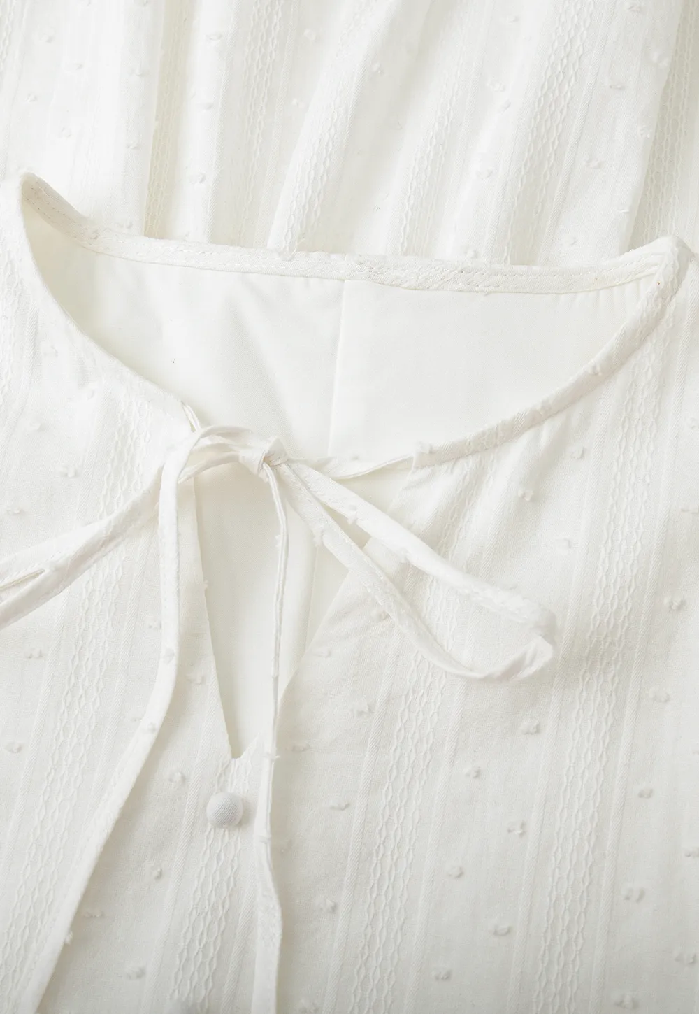 Elegant Long Sleeve Mini Dress with Flared Hem and Neck Tie