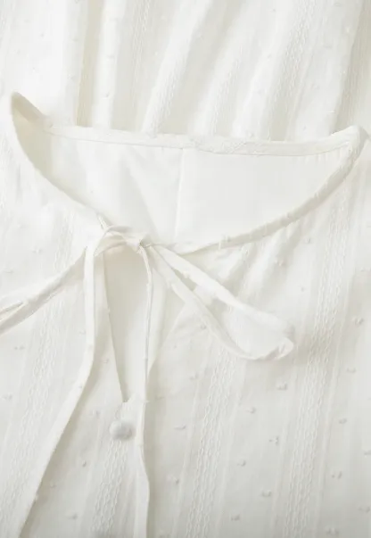 Elegant Long Sleeve Mini Dress with Flared Hem and Neck Tie