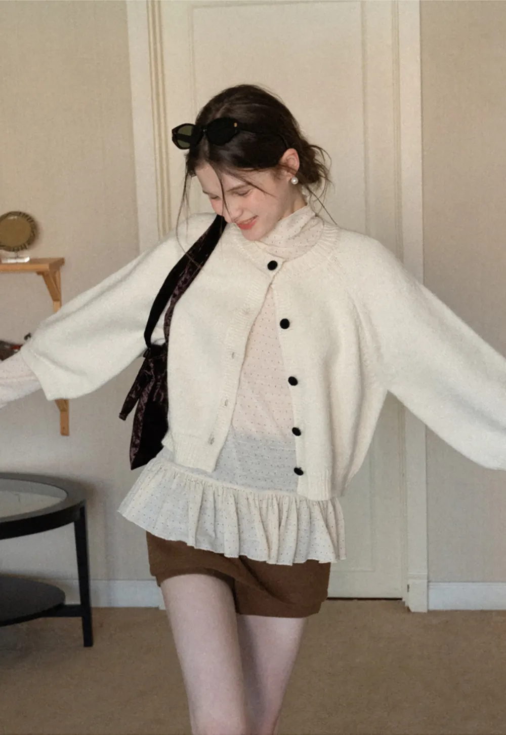 Soft knit cardigan with button front and relaxed fit