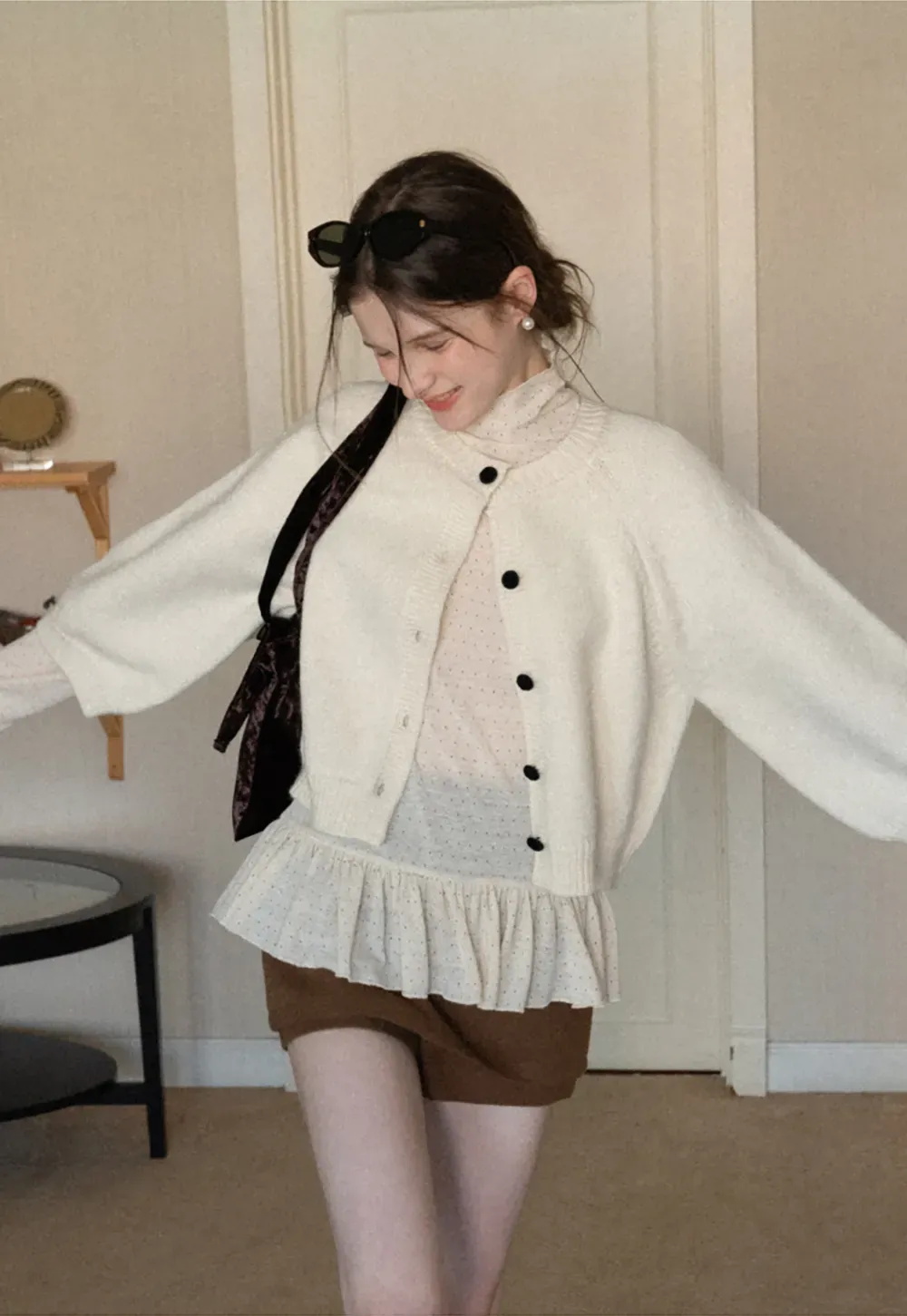 Soft knit cardigan with button front and relaxed fit