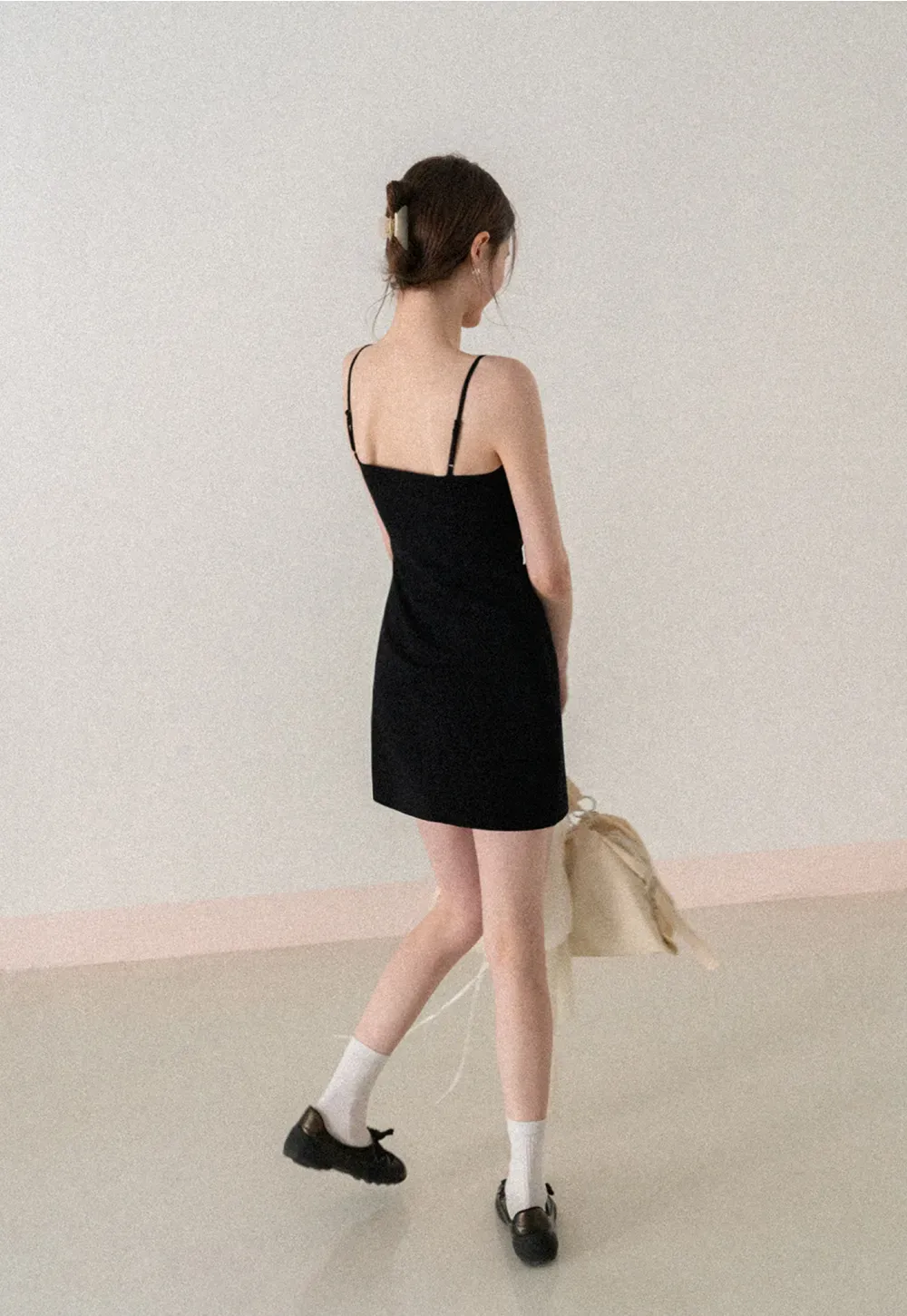 Sleeveless fitted mini dress with thin straps