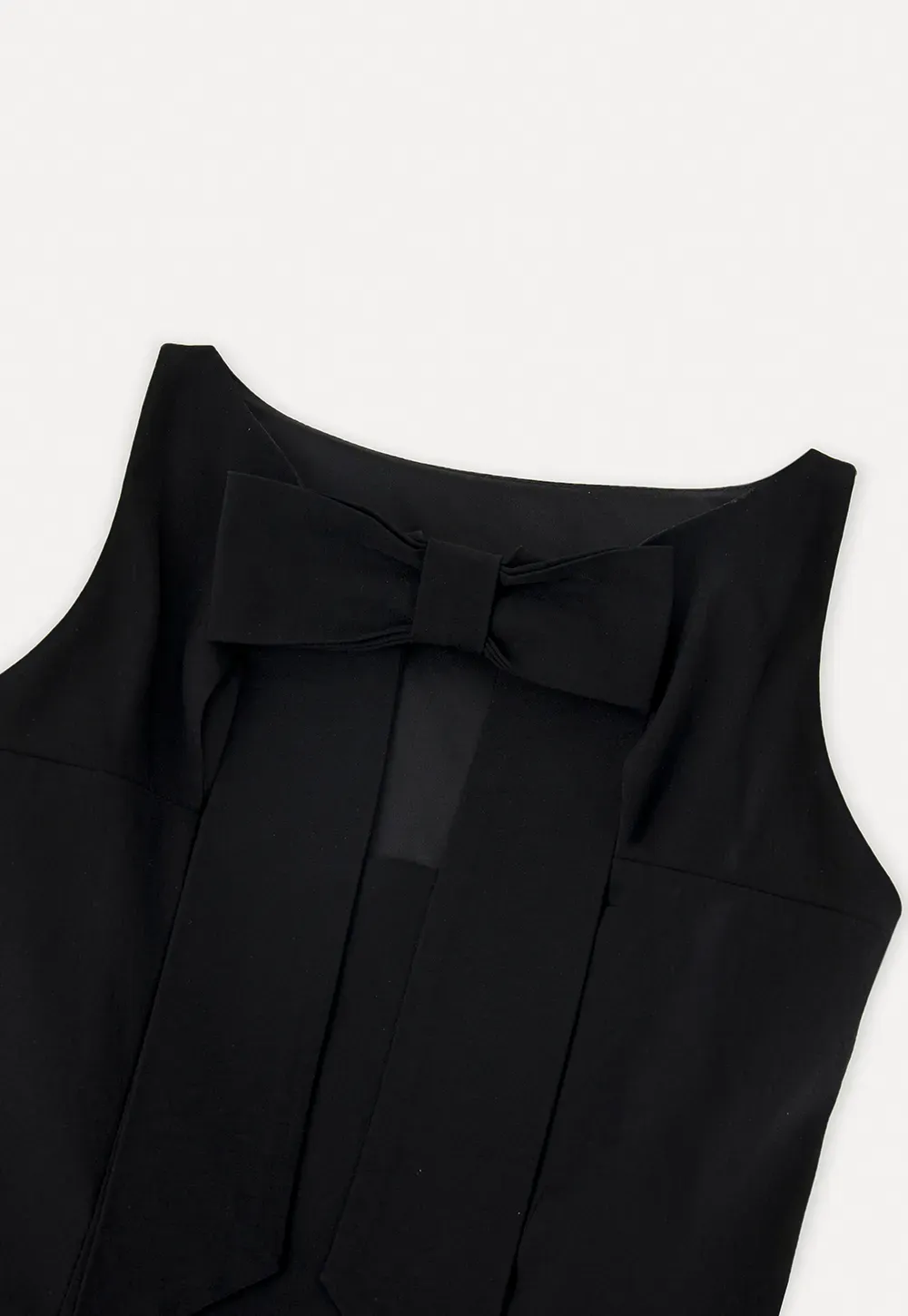Sleeveless dress with back bow detail