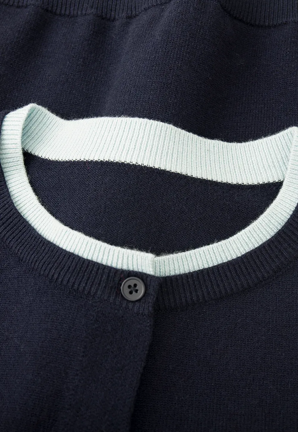 Elegant Round Neck Knit Sweater with Button Detail