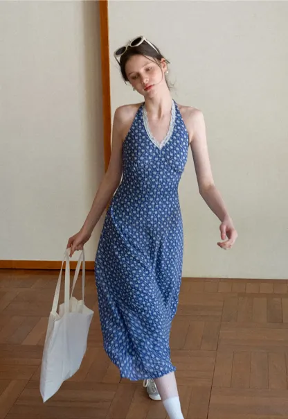 Halter neck dress with floral print and lace trim