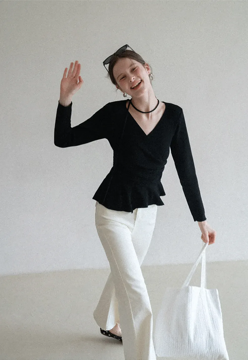 Long sleeve wrap knit sweater with ruched detail