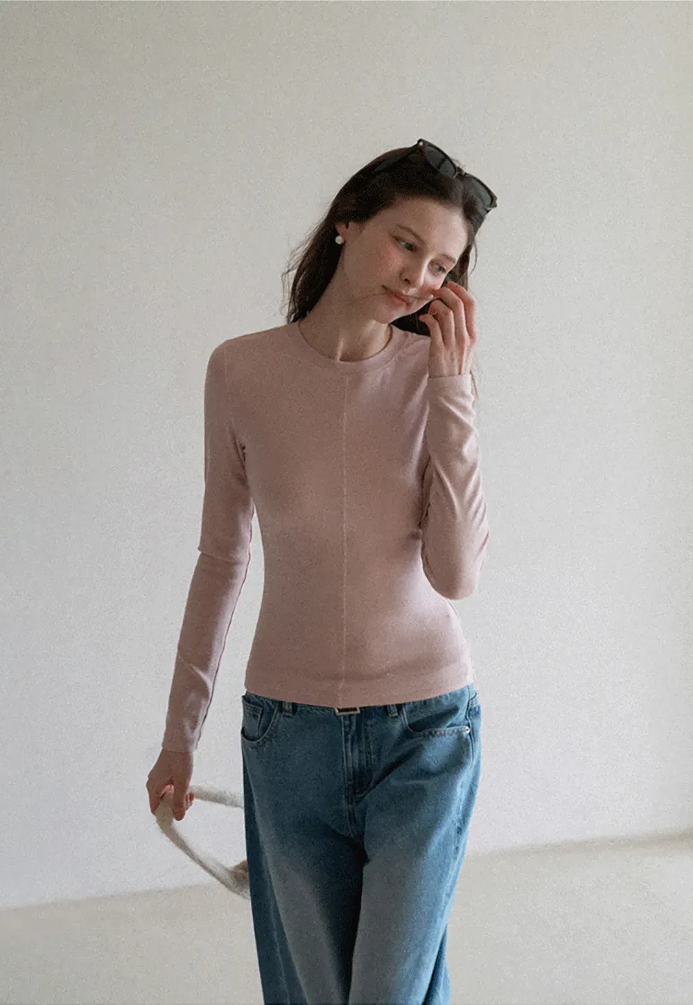 Long sleeve top with ruffled hem and layered design