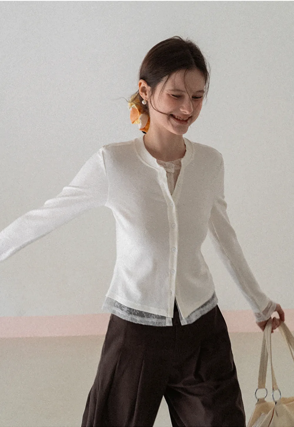 Long sleeve button front knit top with collar