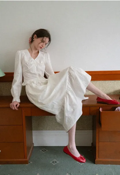 Shirt with ruffled sleeves and layered skirt