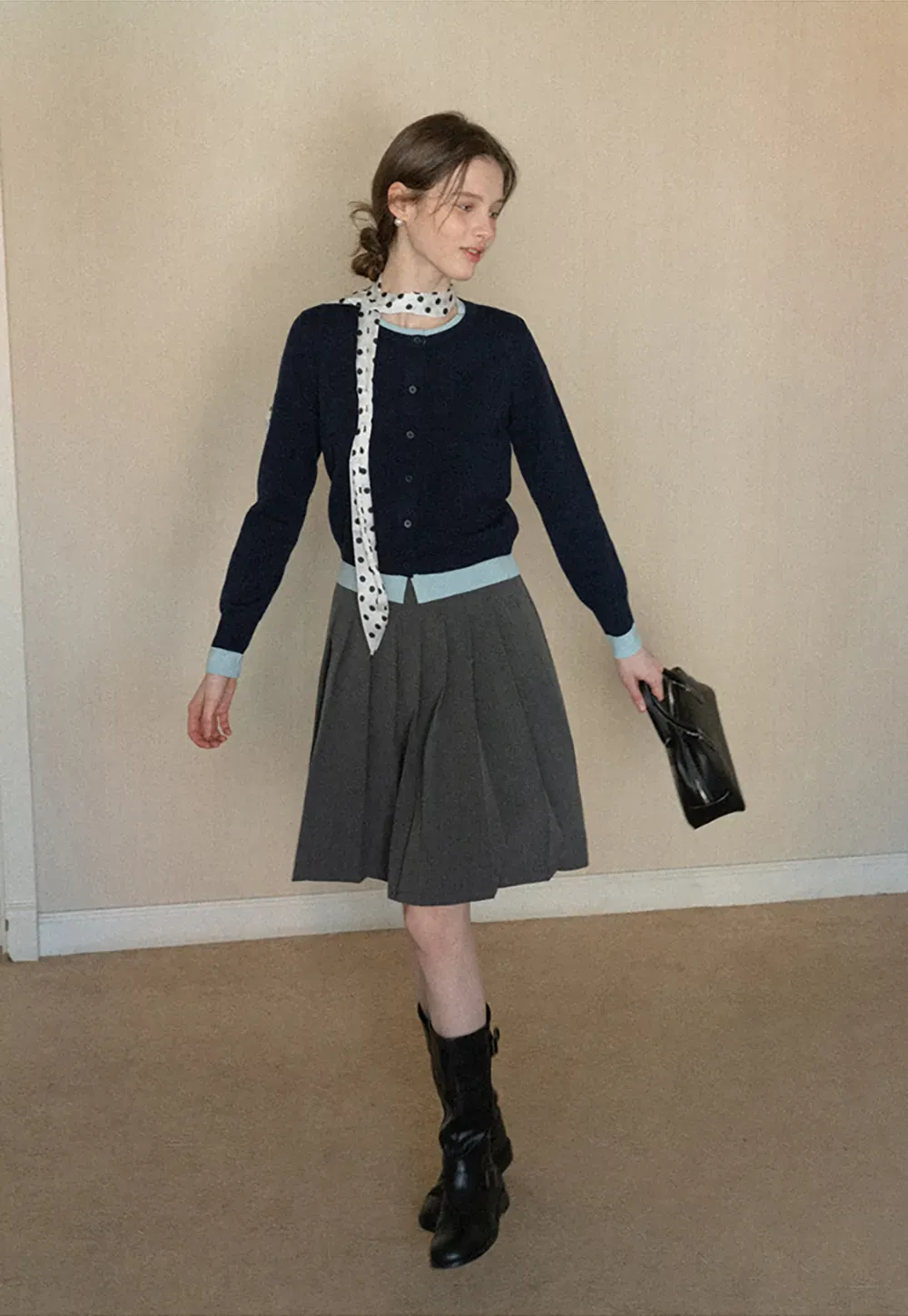 Elegant polka dot neck tie with bow design for women's fashion.