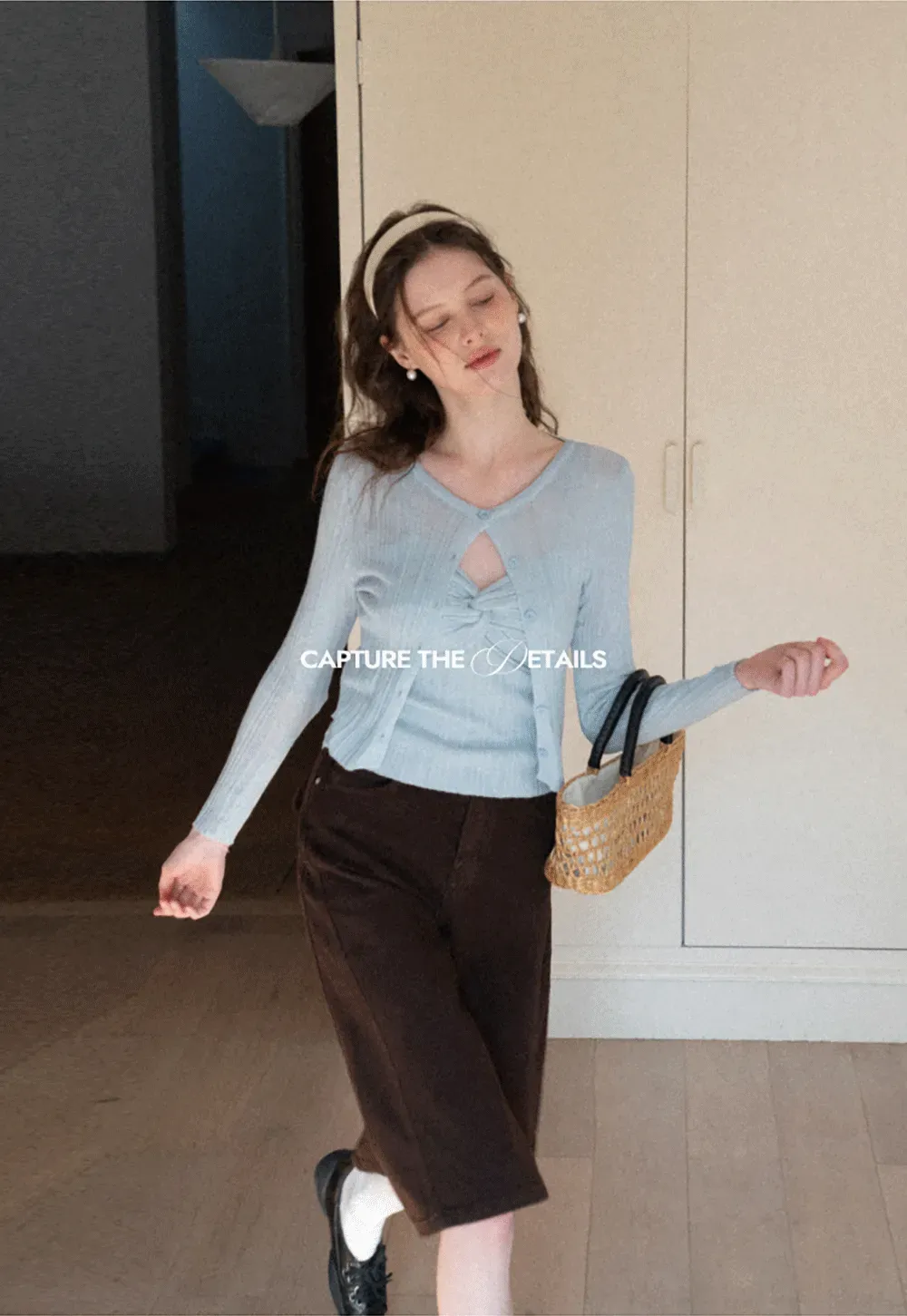 Ribbed knit sweater with V neckline and long sleeves