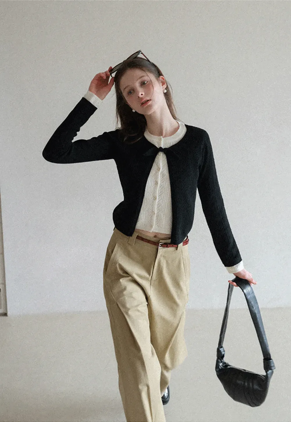 Elegant Knit Cardigan with Bow Detail and Ribbed Texture