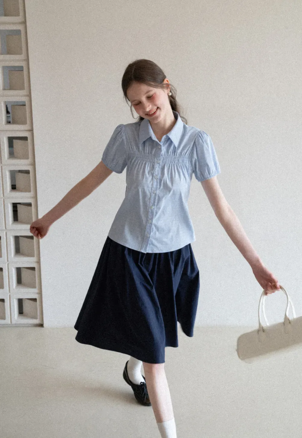 A-line pleated midi skirt with waistband