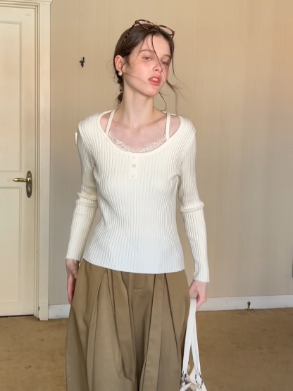 Ribbed knit sweater with boat neck and long sleeves