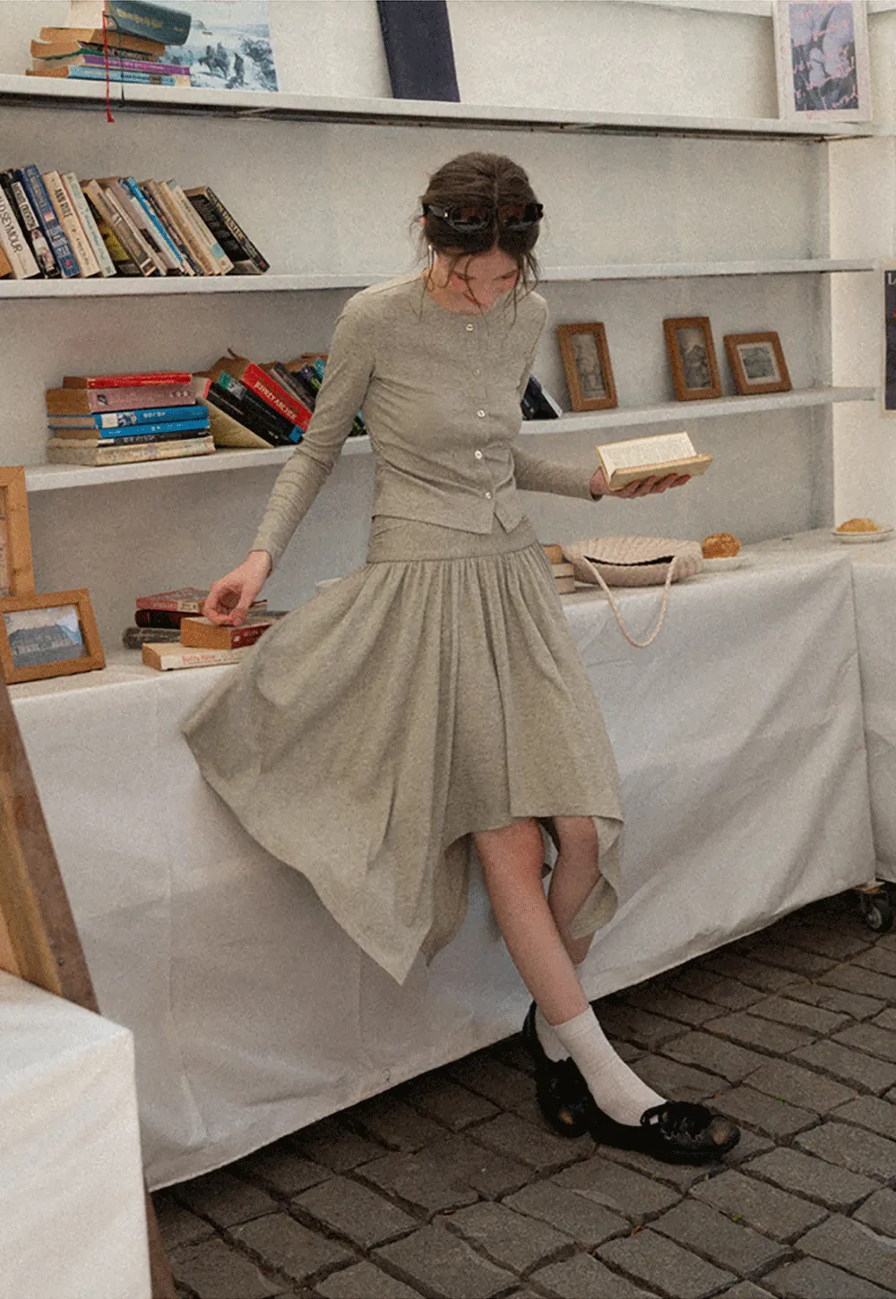 Long sleeve button front top and asymmetrical skirt