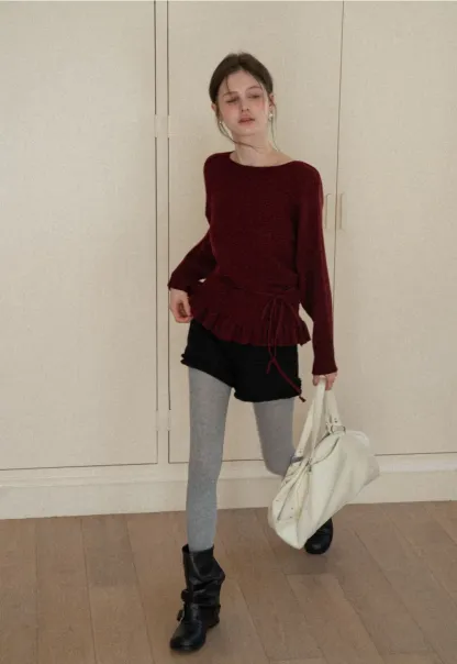 High waist shorts with ruffle hem and belt design