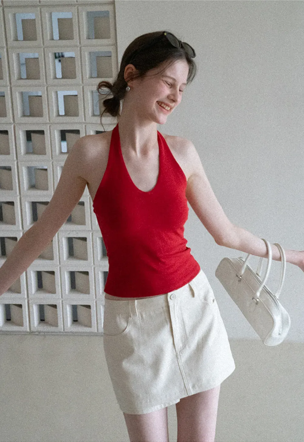 High waist pleated mini skirt with button front design