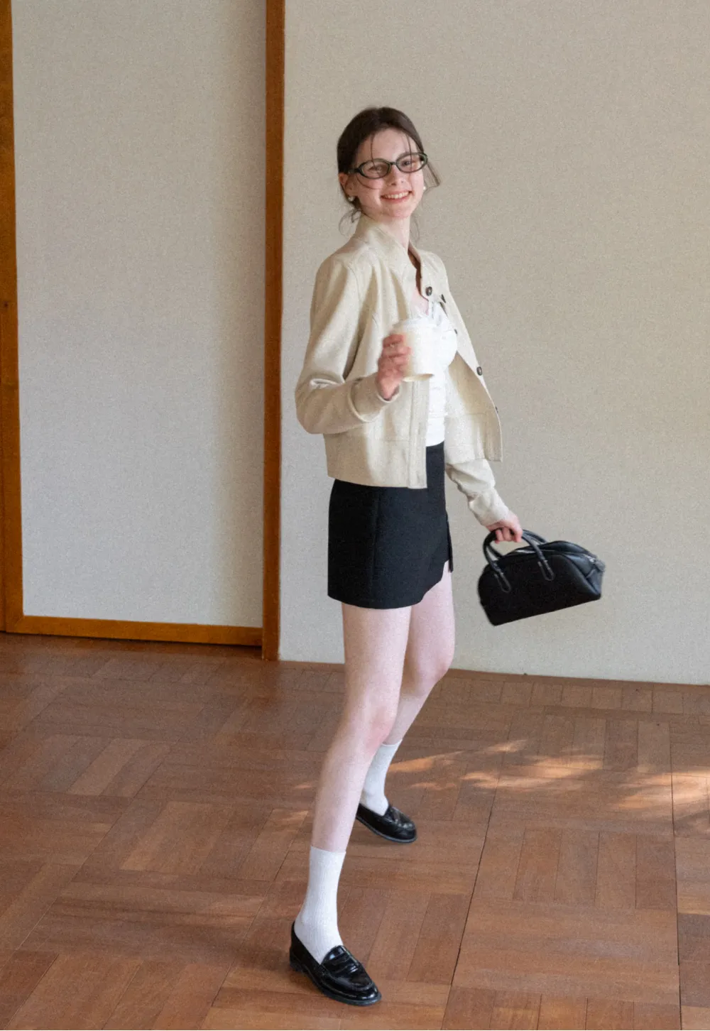 Short jacket with button front and ribbed cuffs