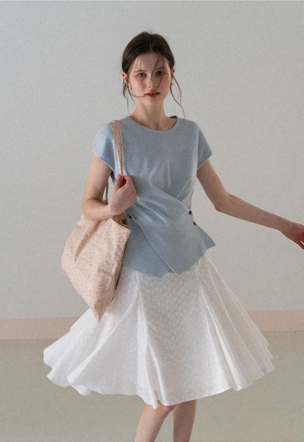 Flared pleated skirt with subtle texture