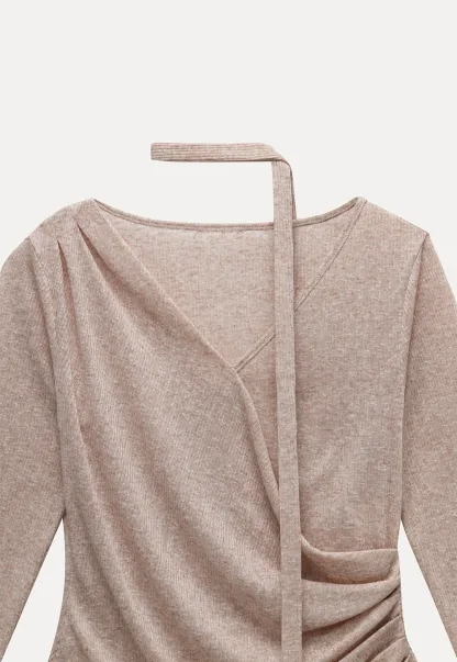 Asymmetrical rap-front draped knit top