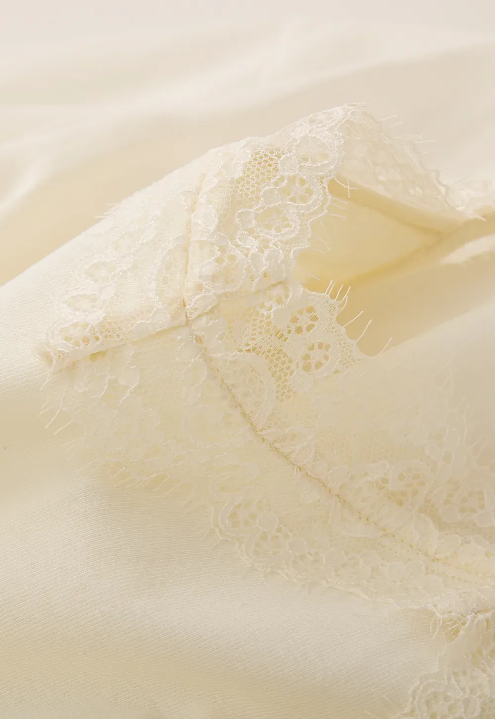 Lace Trimmed V Neck Long Sleeve Wrap Shirt