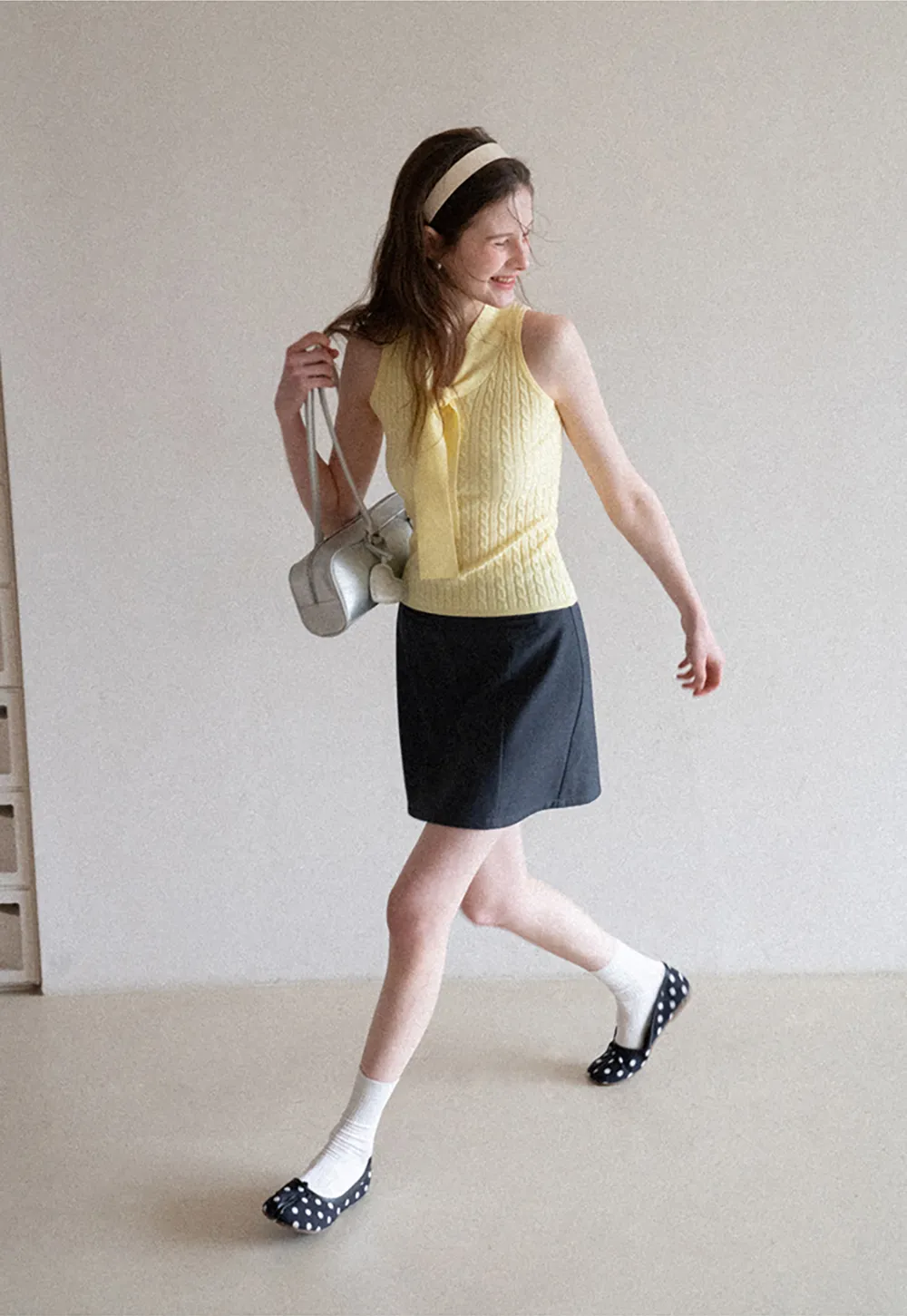 Knit Sleeveless Top with Front Bow Detail