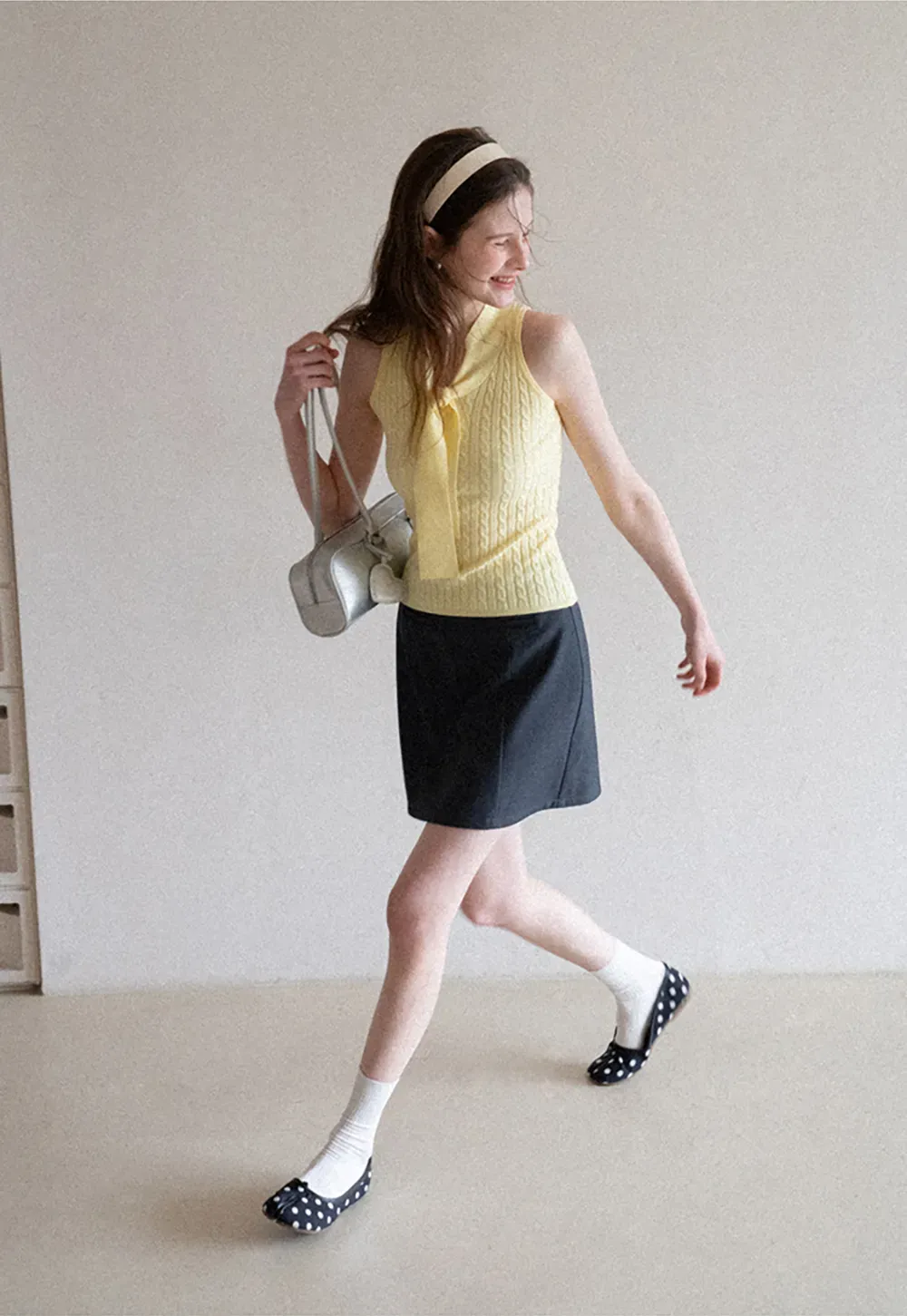 Knit Sleeveless Top with Front Bow Detail