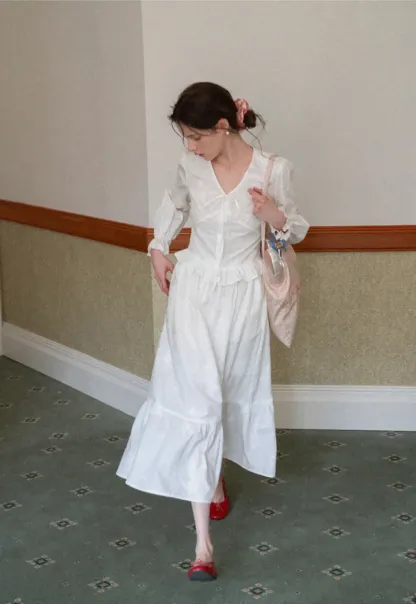 Shirt with ruffled sleeves and layered skirt