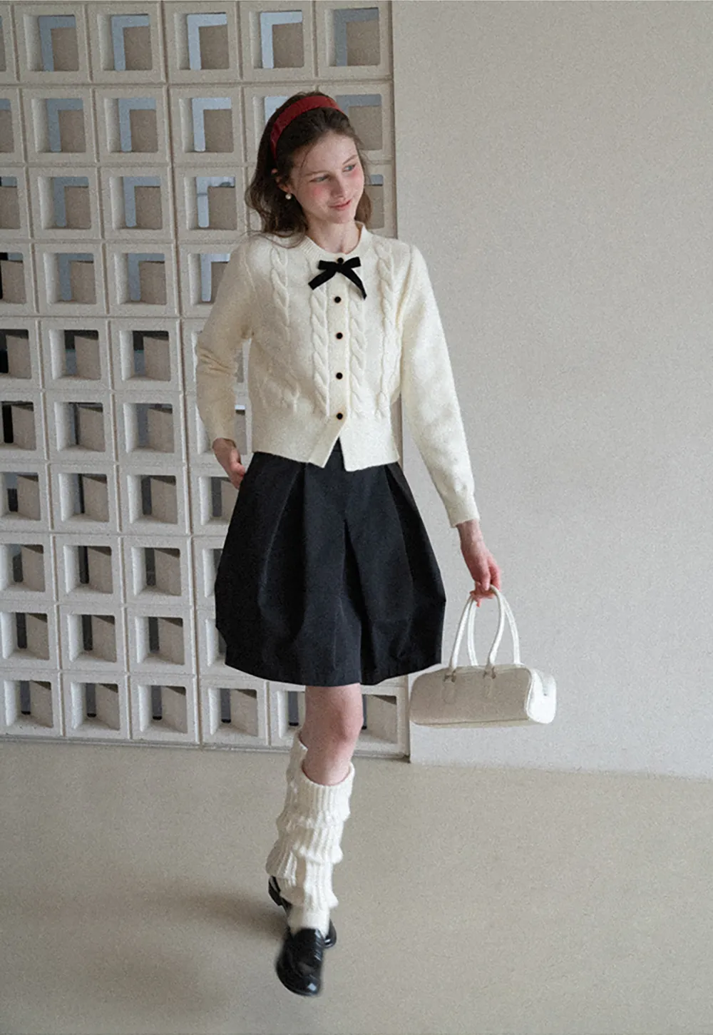 Elegant Cable Knit Cardigan with Bow Detail