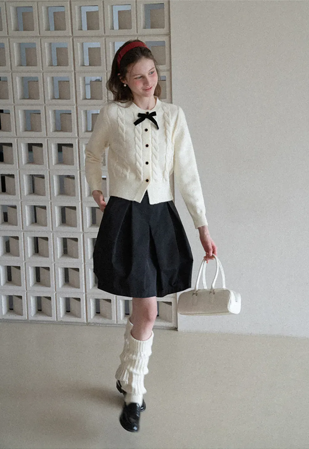 Elegant Cable Knit Cardigan with Bow Detail