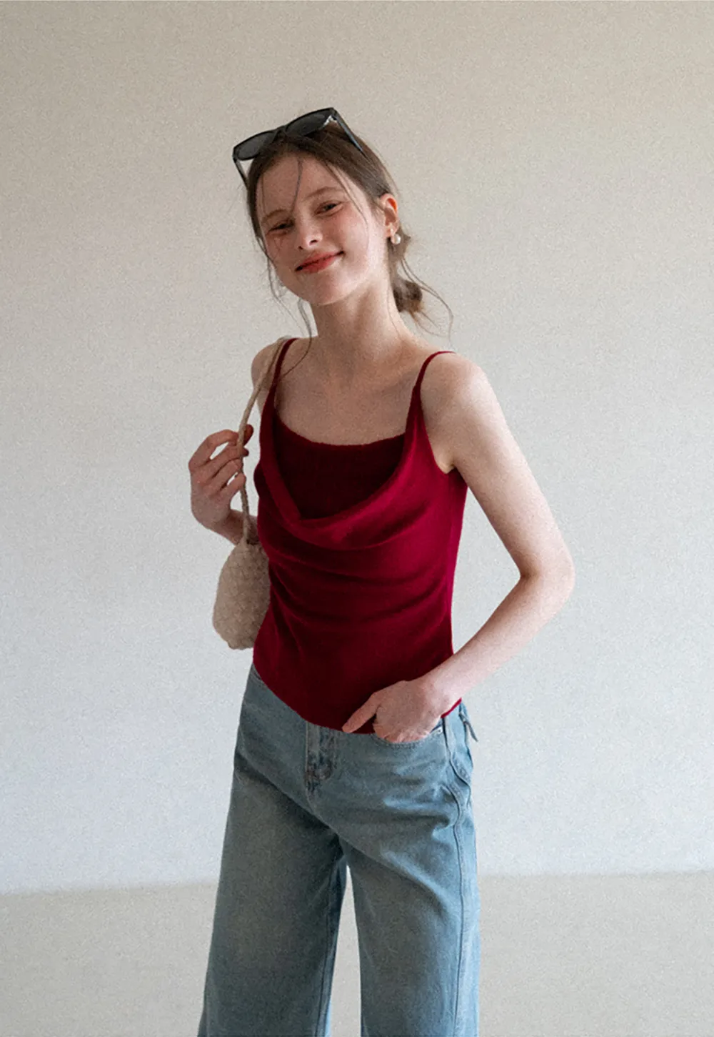 Silk-like tank top with thin straps and draped neckline