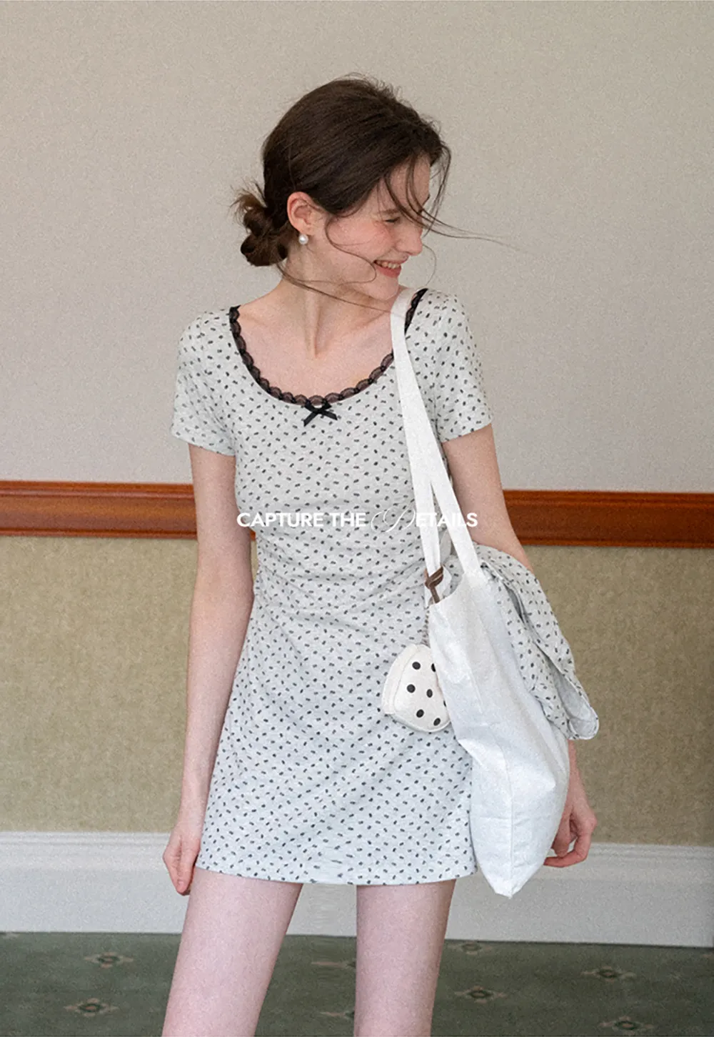 Polka dot dress with lace trim and matching cardigan