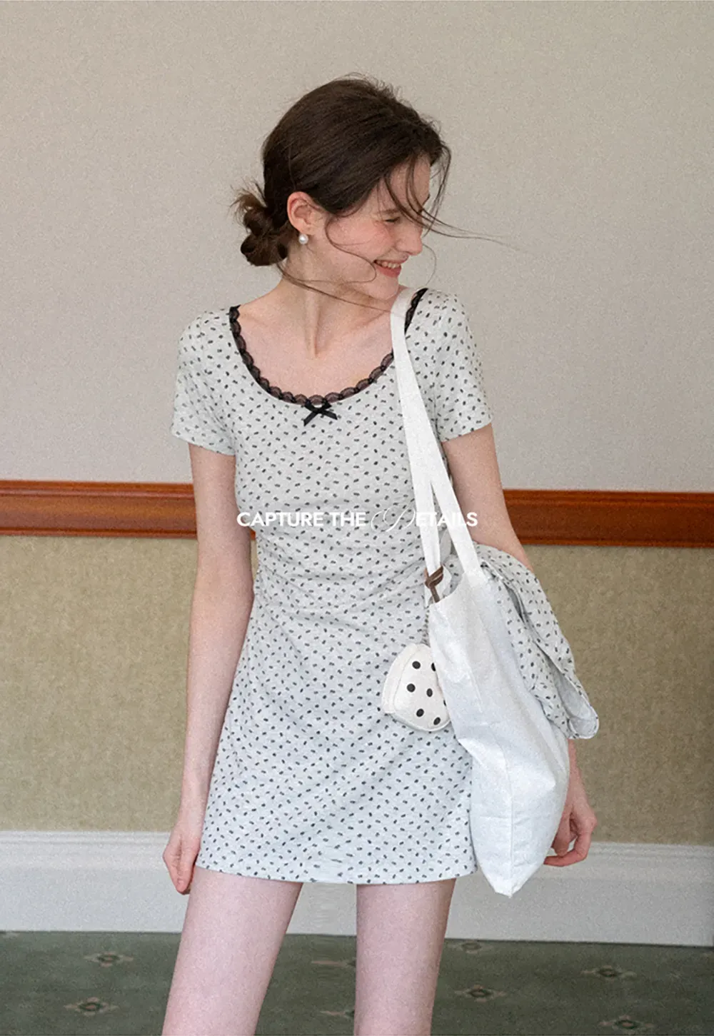 Polka dot dress with lace trim and matching cardigan