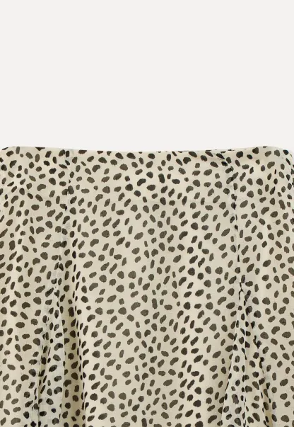 Flowing hem leopard print skirt with ruffle details