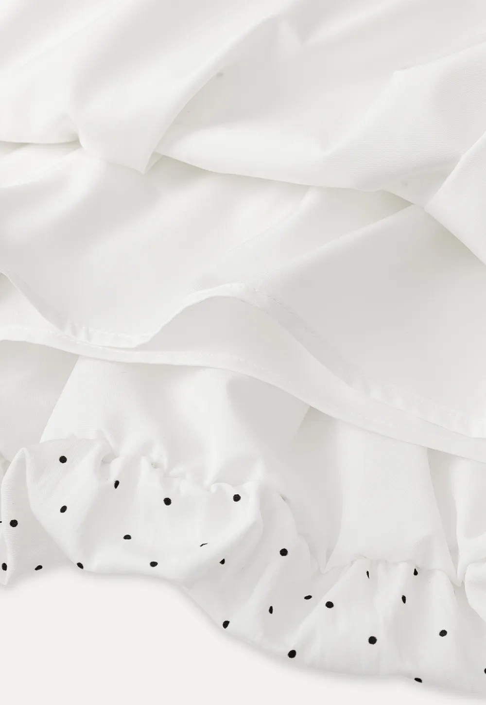 Polka dot pleated mini skirt with drawstring waist