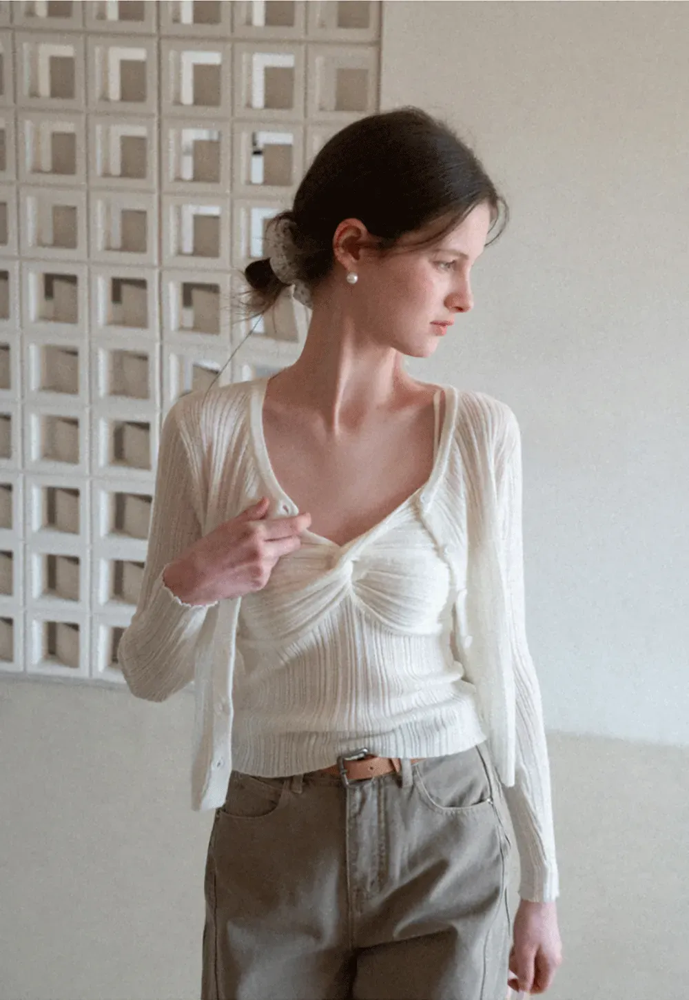 Ribbed knit sweater with V neckline and long sleeves