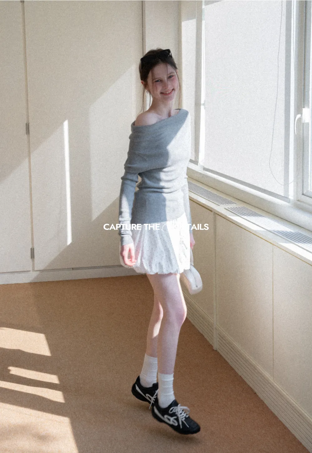 Polka dot pleated mini skirt with drawstring waist