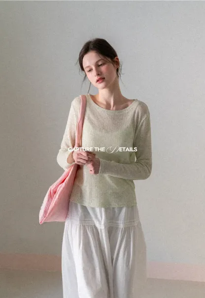 Long sleeve sheer knit top with round neckline