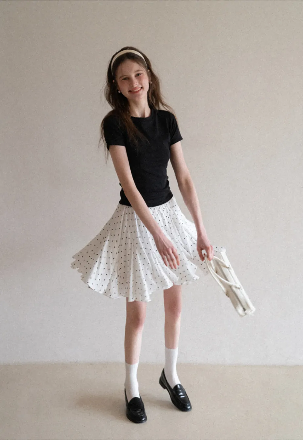 Polka dot pleated skirt with elastic waistband