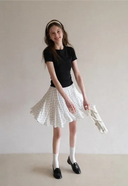 Polka dot pleated skirt with elastic waistband
