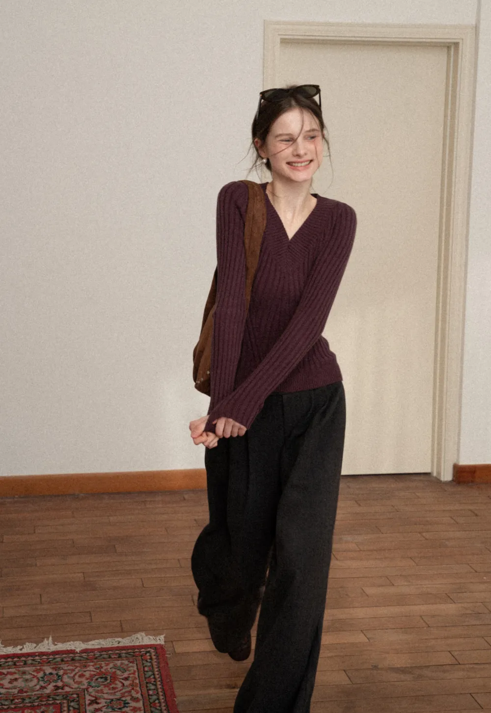 Elegant Ribbed Knit Sweater with V-Neck Design