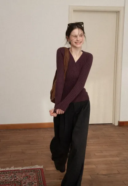 Elegant Ribbed Knit Sweater with V-Neck Design