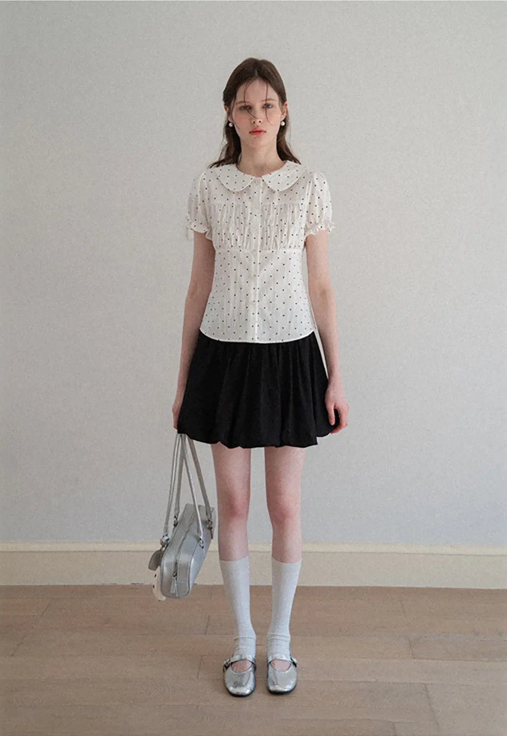 Polka dot shirt with ruffled sleeves and Peter Pan collar