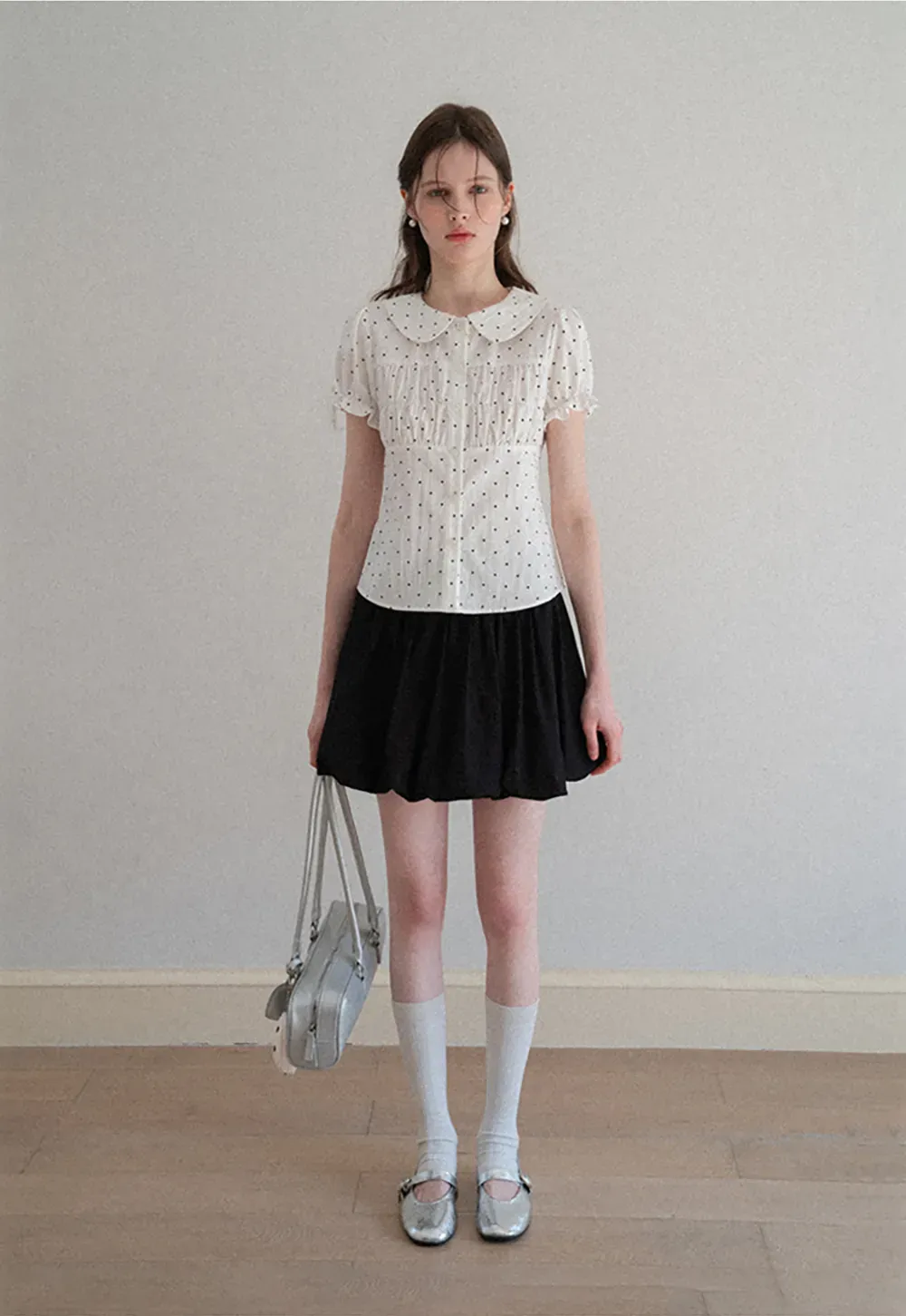 Polka dot shirt with ruffled sleeves and Peter Pan collar