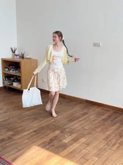 Floral Print Pleated Skirt with Asymmetrical Hem