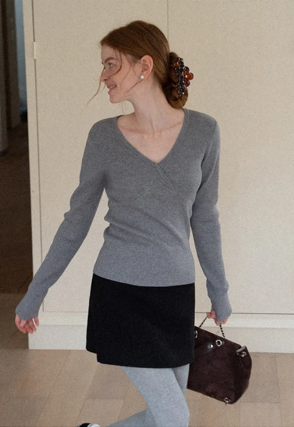 A-line mini skirt with textured fabric and central seam design