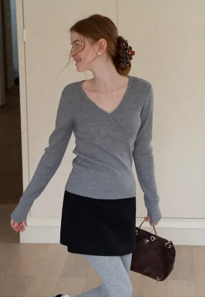 A-line mini skirt with textured fabric and central seam design