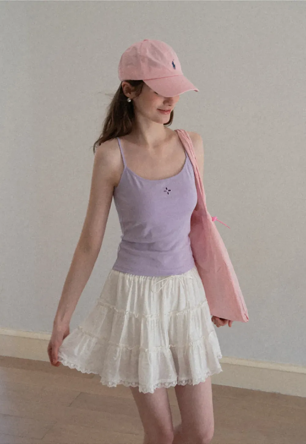 Gray tank top with small embroidered cross detail