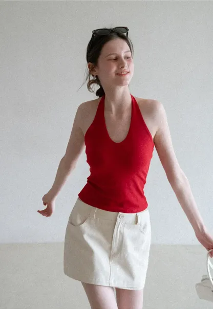 High waist pleated mini skirt with button front design