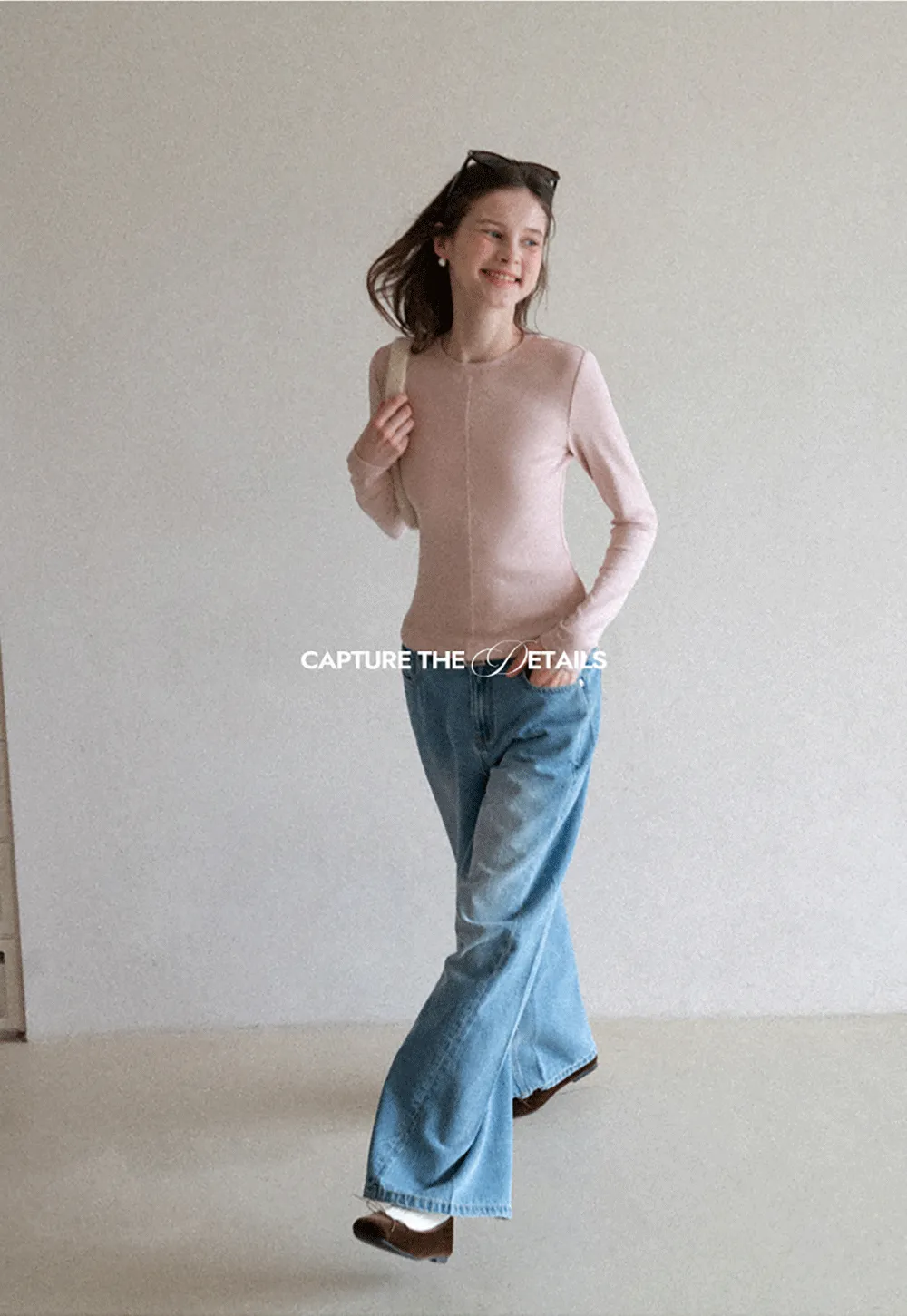 Long sleeve top with ruffled hem and layered design